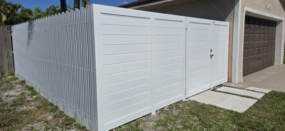 Modern horizontal aluminum slat fence with no gaps
