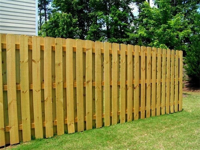 Wood shadowbox fence with weathering